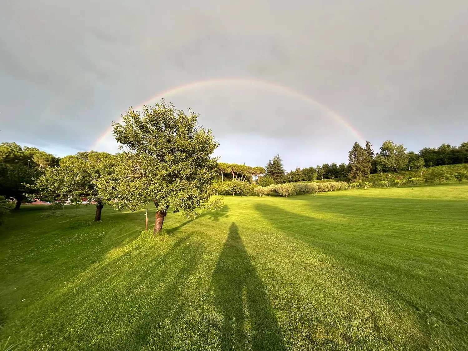 Rainbow over the countryside at Cavallina Retreat, in the hills above Lake Garda
